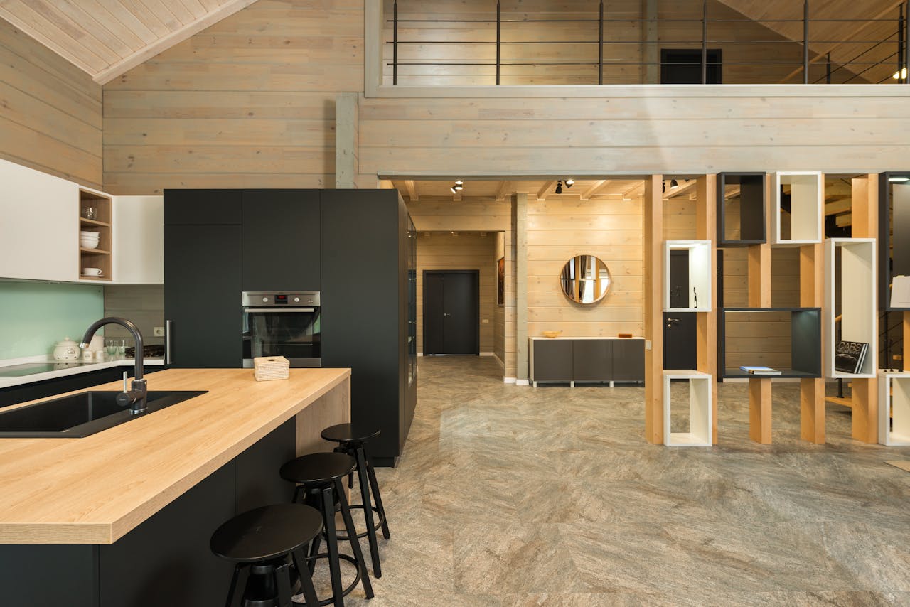 services-04 Interior design of modern kitchen with matte cupboards and built in appliances in minimalist spacious private house